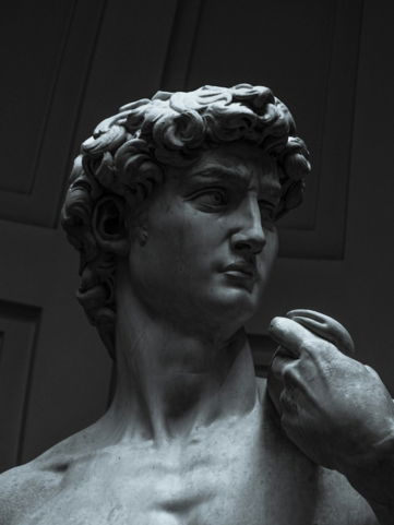 gray concrete statue of woman